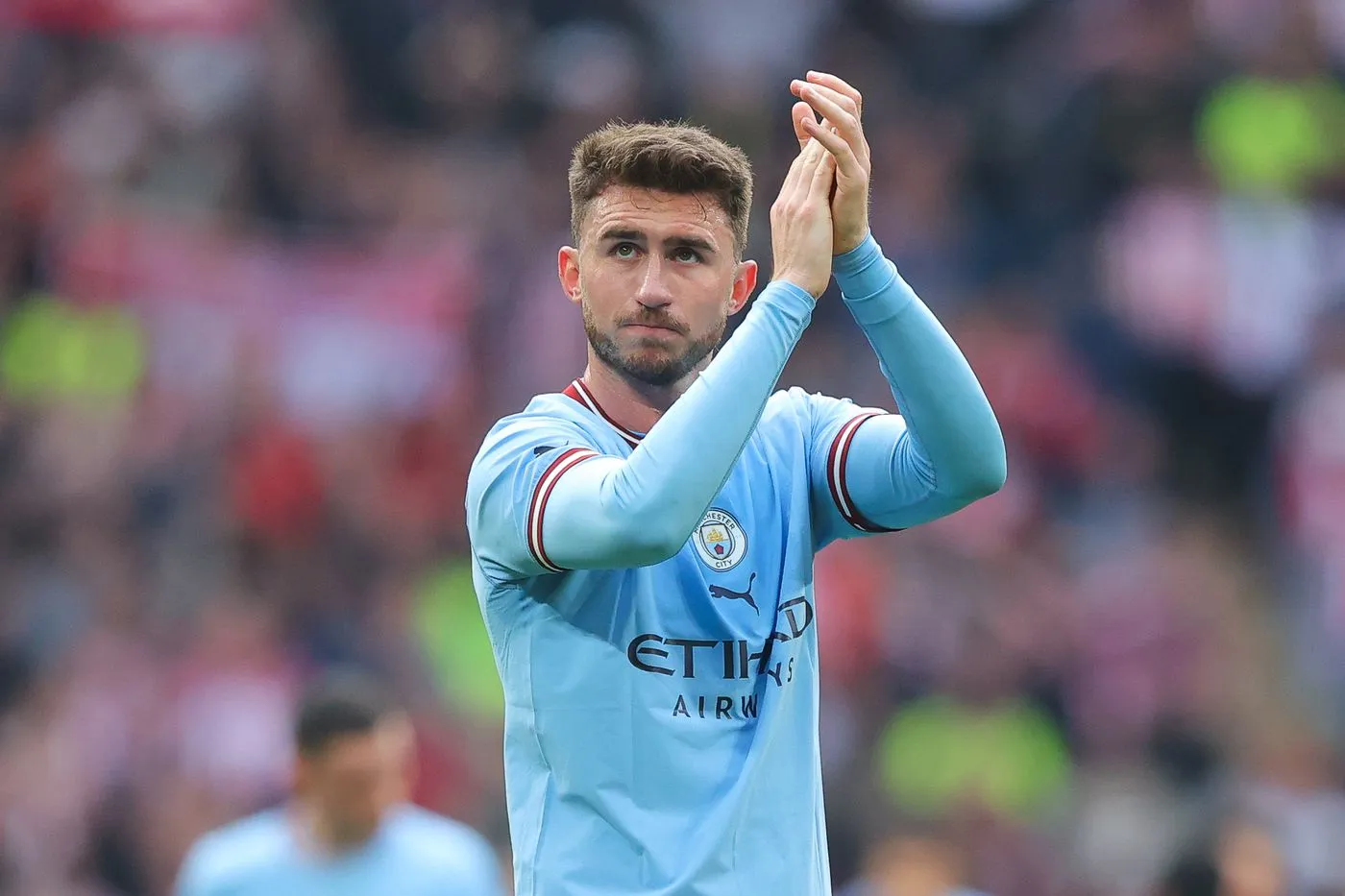 Aymeric Laporte reacts to Arsenal dropping points in the title race